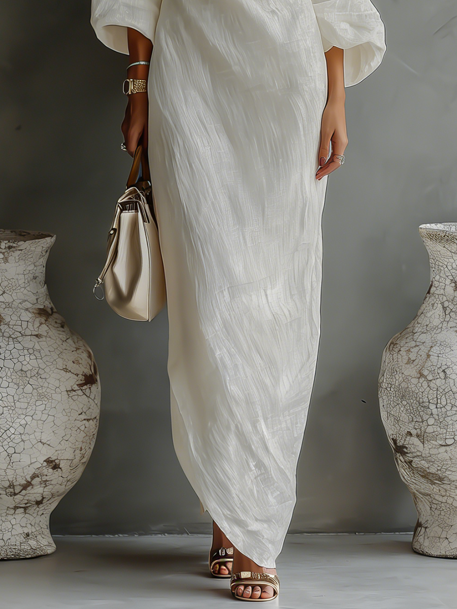 Elegant Flowing Dress in Ivory White with Off-Shoulder Design