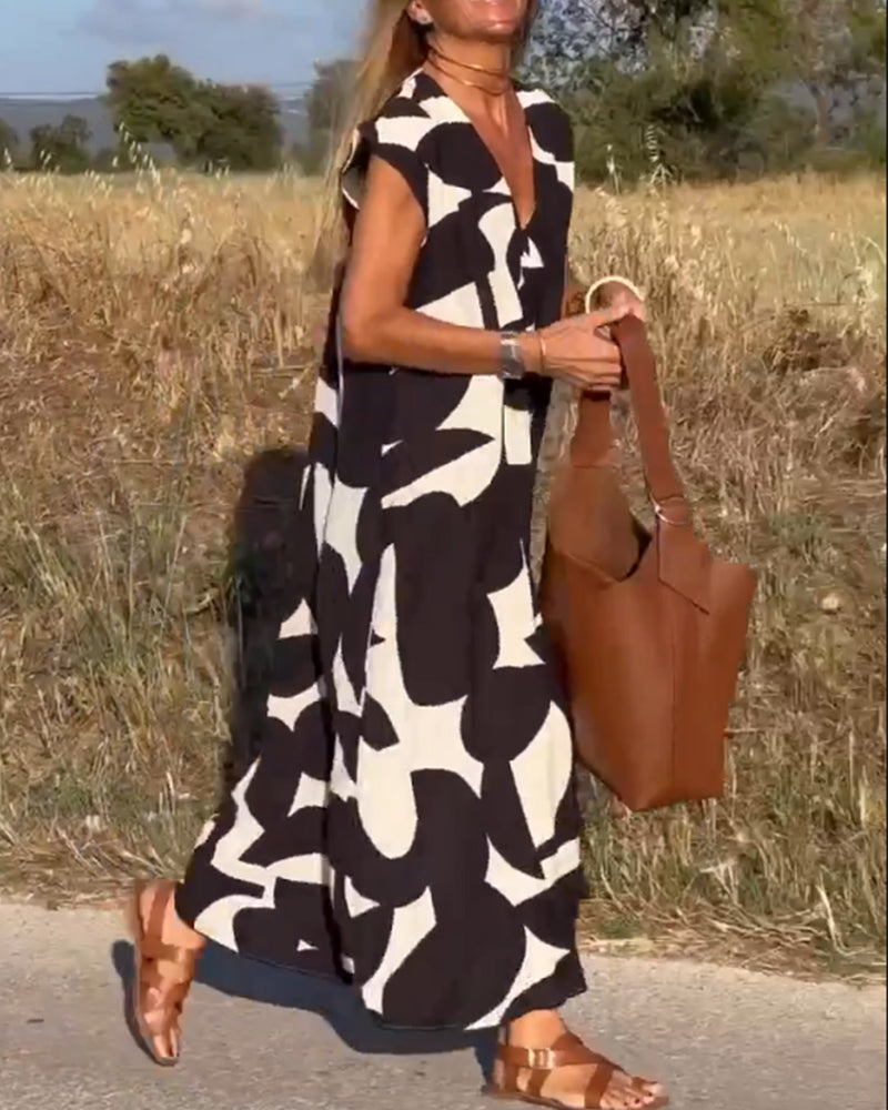 NAOMI | Long Printed Dress with V-Neck and Flared Fit for a Vacation Look
