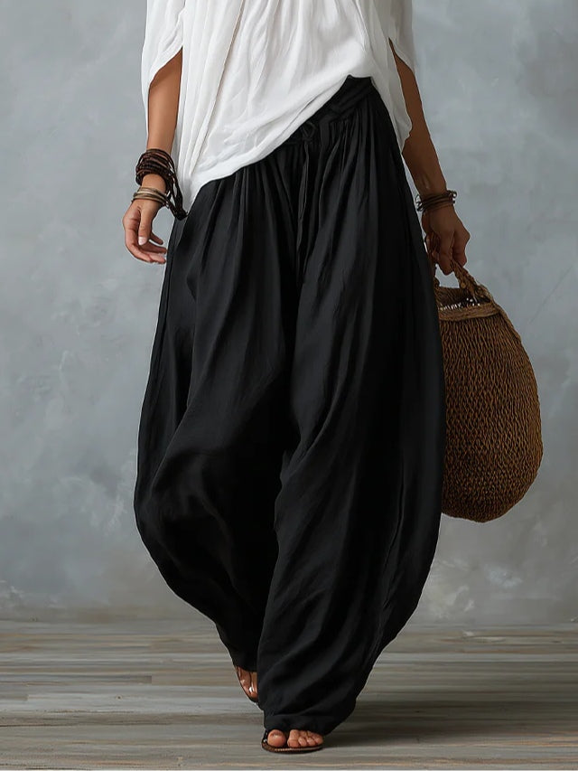 White off-shoulder top and lantern-style flared pants