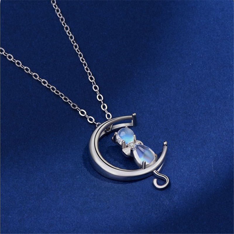Necklace with moonstone in the shape of a crescent moon and cat