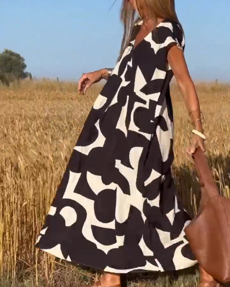 NAOMI | Long Printed Dress with V-Neck and Flared Fit for a Vacation Look