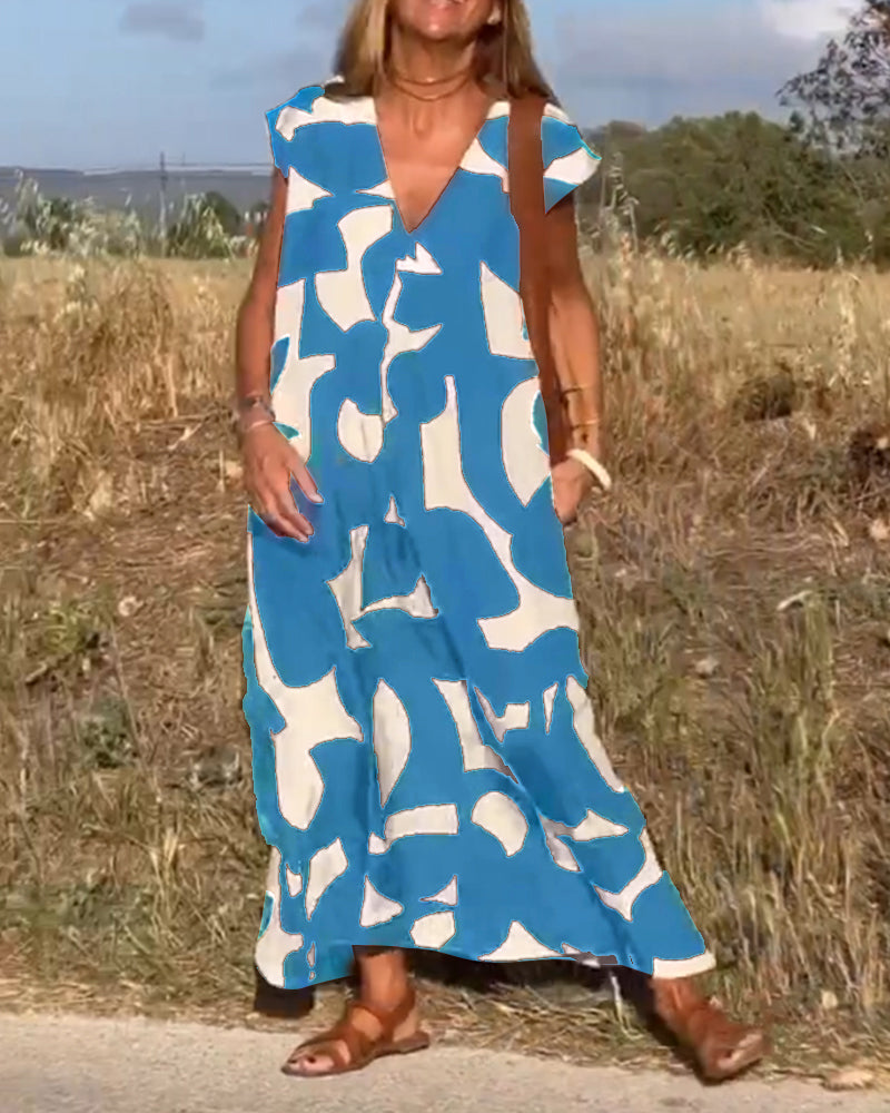 NAOMI | Long Printed Dress with V-Neck and Flared Fit for a Vacation Look