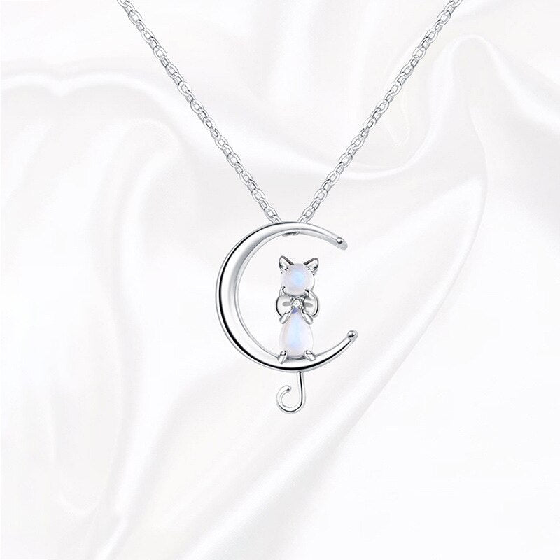 Necklace with moonstone in the shape of a crescent moon and cat